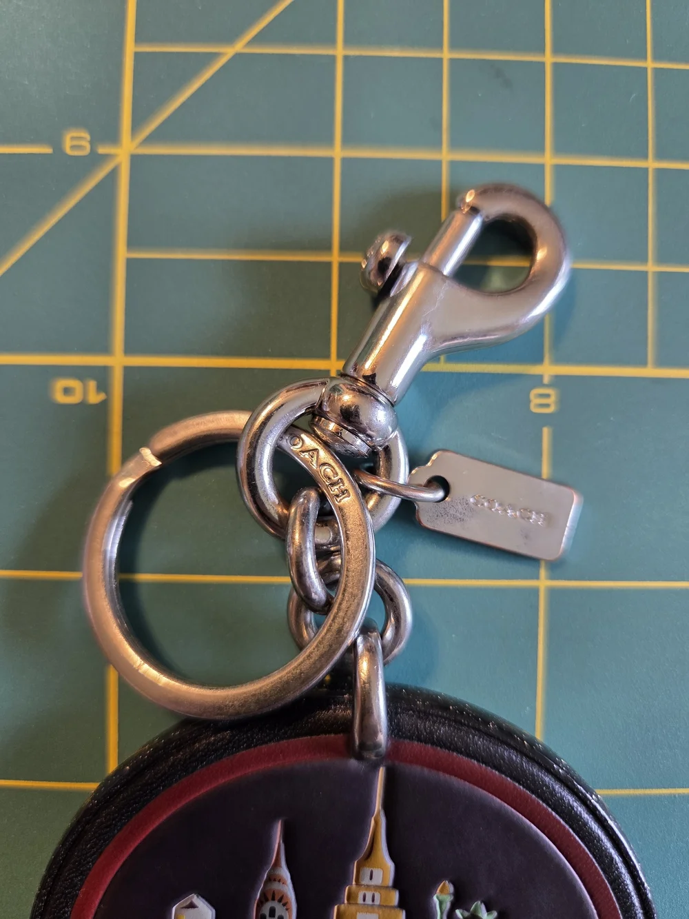 COACH New York Round Leather Keychain - Black with Gold Accents